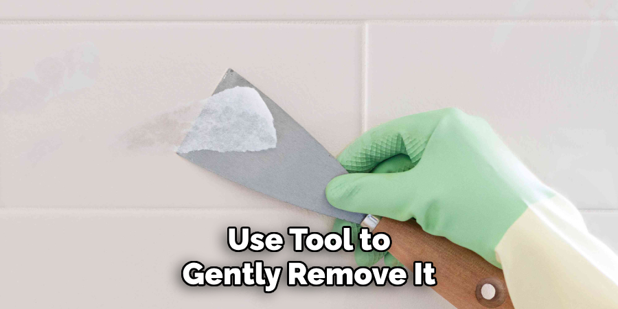 Use Tool to Gently Remove It