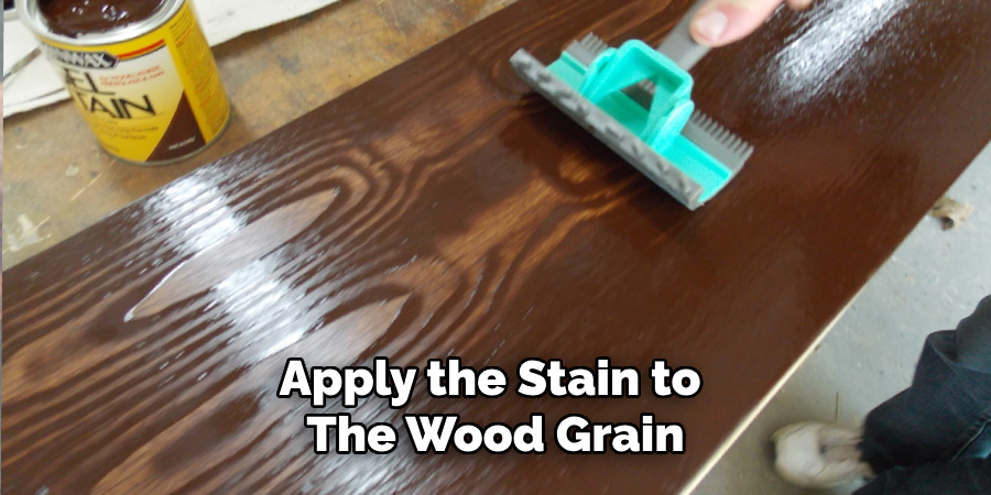 Apply the Stain to 
The Wood Grain