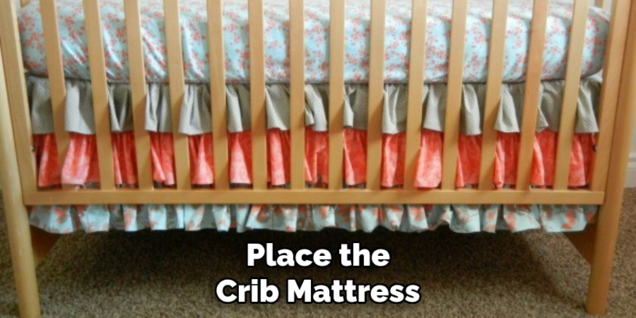 Place the Crib Mattress