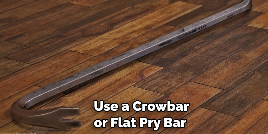 Use a Crowbar or Flat Pry Bar 