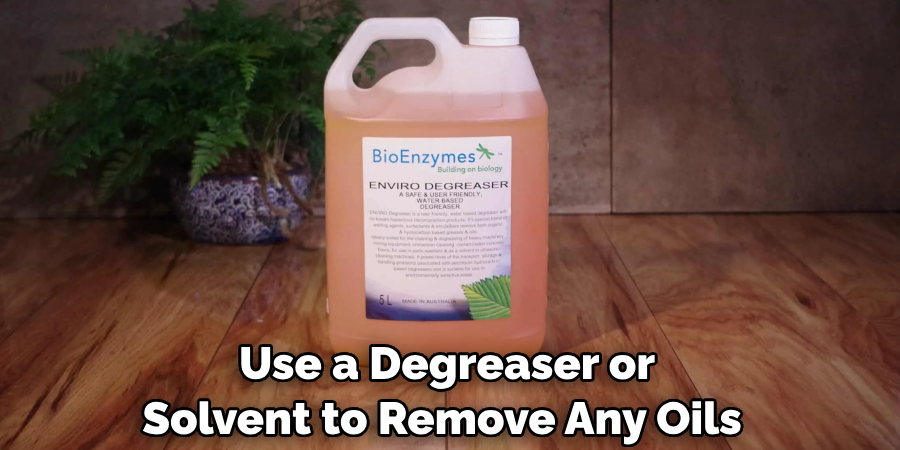  Use a Degreaser or Solvent to Remove Any Oils