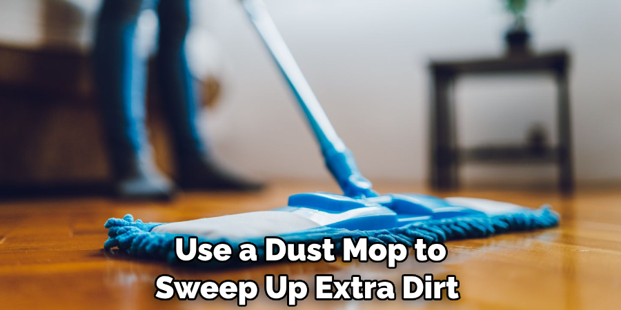 Use a Dust Mop to Sweep Up Extra Dirt 