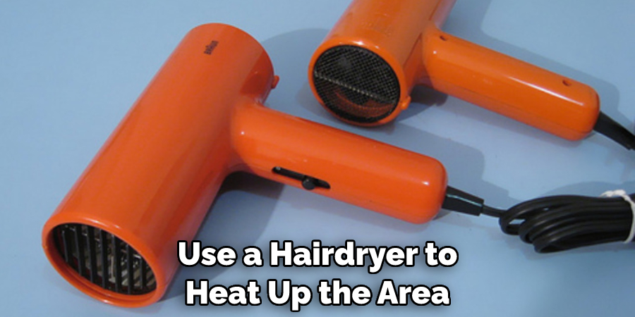 Use a Hairdryer to Heat Up the Area