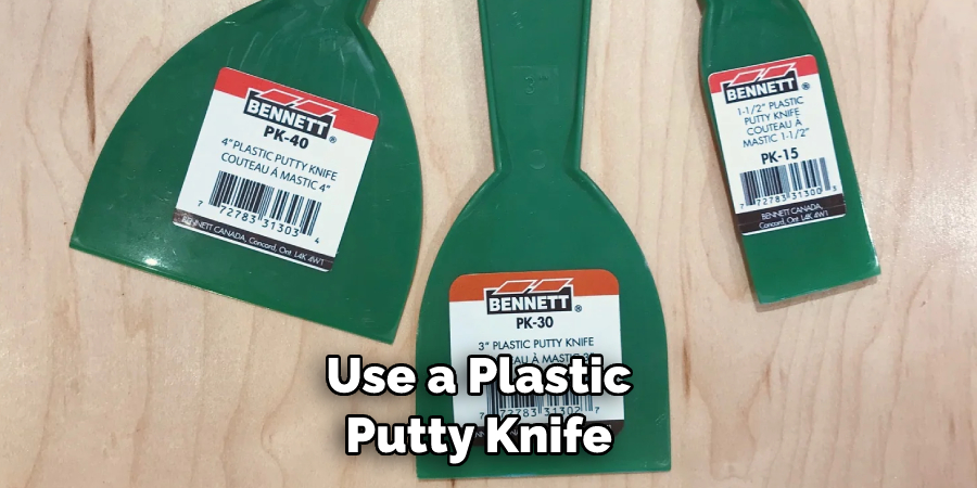 Use a Plastic Putty Knife