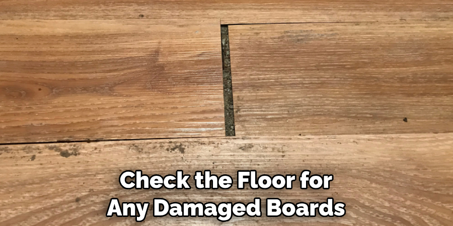 Check the Floor for Any Damaged Boards