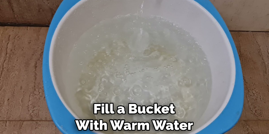 Fill a Bucket With Warm Water