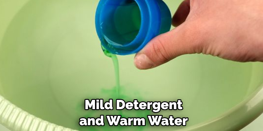 Mild Detergent and Warm Water