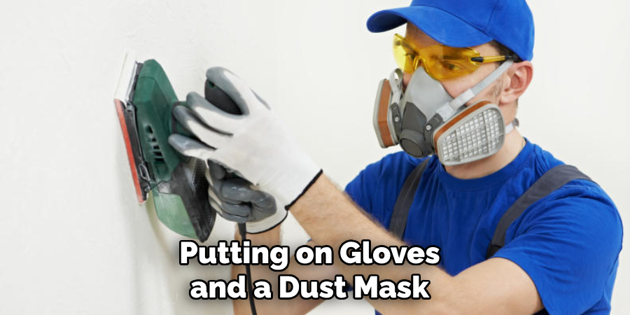 Putting on Gloves and a Dust Mask