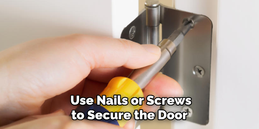  Use Nails or Screws to Secure the Door