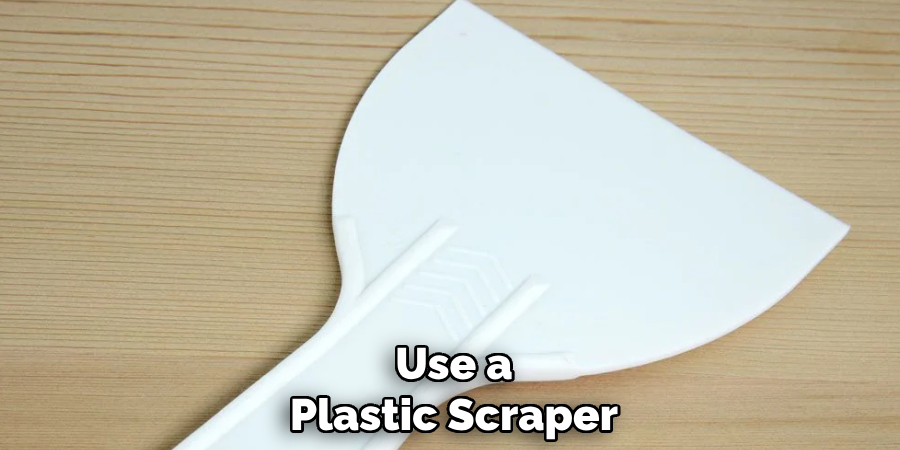 Use a Plastic Scraper